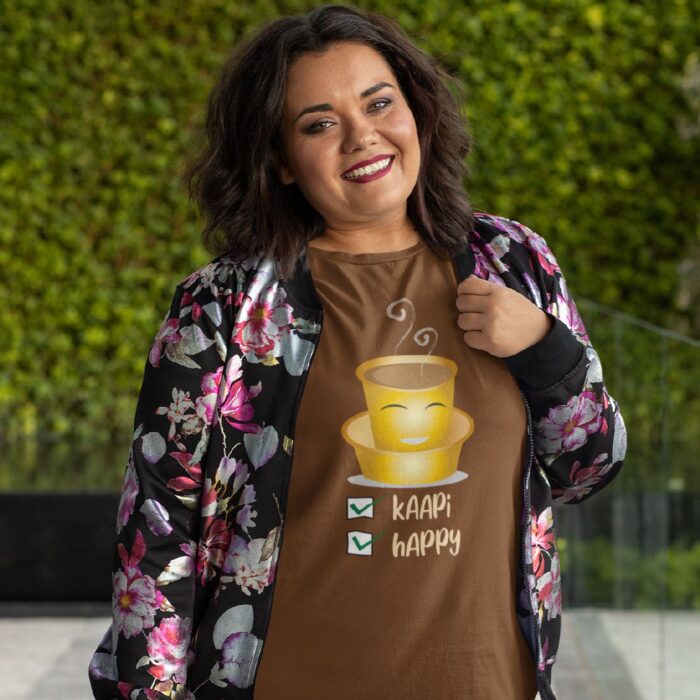 plus-size-t-shirt-mockup-featuring-a-joyful-woman-posing-in-front-of-a-leafy-background-31077.png