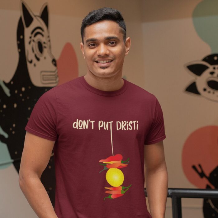 t-shirt-mockup-of-a-man-standing-by-a-wall-with-paintings-28960.png