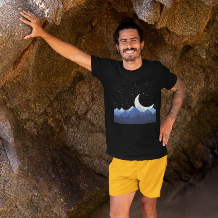t-shirt-mockup-of-a-tattooed-man-leaning-against-a-big-rock-by-the-beach-26804.png