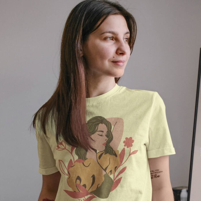basic-t-shirt-mockup-of-a-calm-woman-with-tattoos-at-home-m1605-r-el2.png