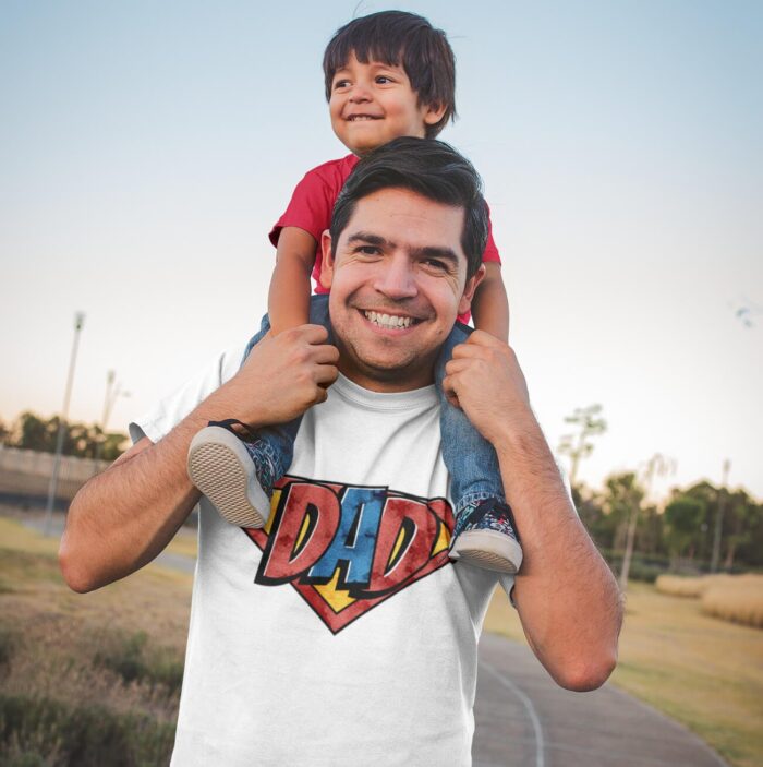 dad-wearing-a-t-shirt-mockup-while-carrying-his-son-a20195.png